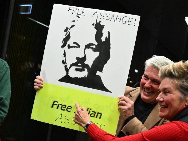 The arrival of Julian Assange and a new report have energised debate over whistleblower protections. (Lukas Coch/AAP PHOTOS)