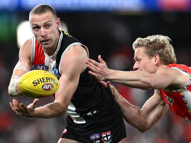 St Kilda's Callum Wilkie felt the pressure from Sydney's Isaac Heeney, who could face scrutiny. (Joel Carrett/AAP PHOTOS)