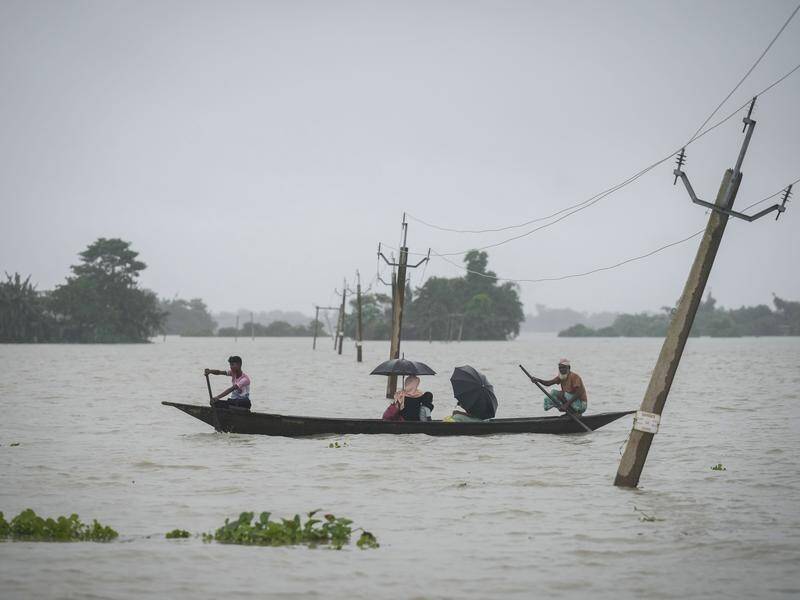 More than 300,000 people have had to leave their homes due to flooding in India. (AP PHOTO)