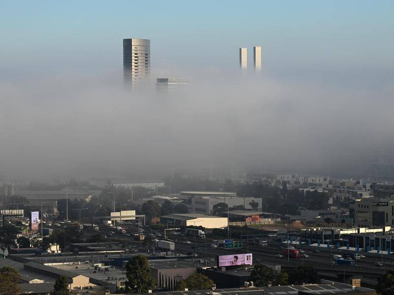 Melbourne was blanketed by fog on a very frosty Thursday morning. (James Ross/AAP PHOTOS)