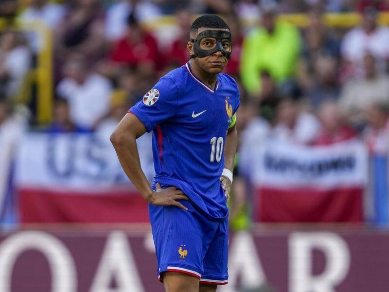 Kylian Mbappe is unhappy with the face mask he has to wear during matches after breaking his nose. (AP PHOTO)