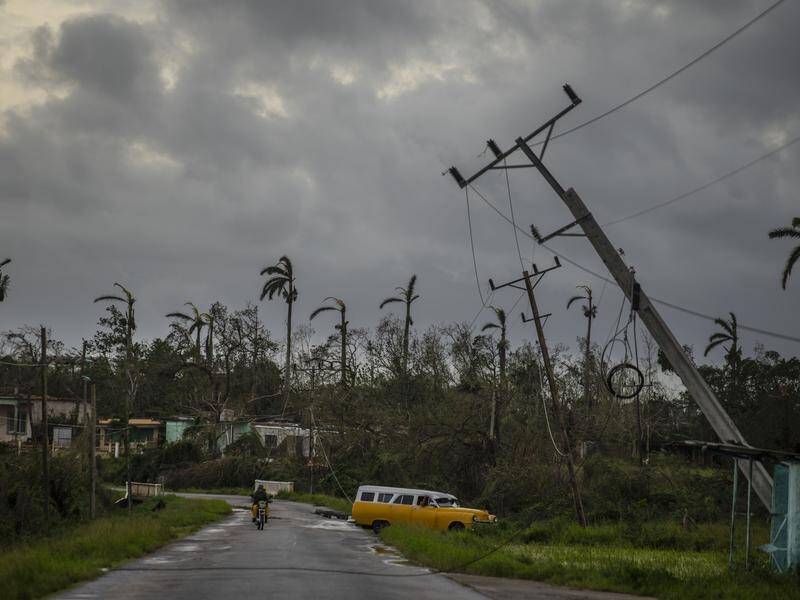 "There is no electricity service in any part of the country right now," a union official says. (AP PHOTO)