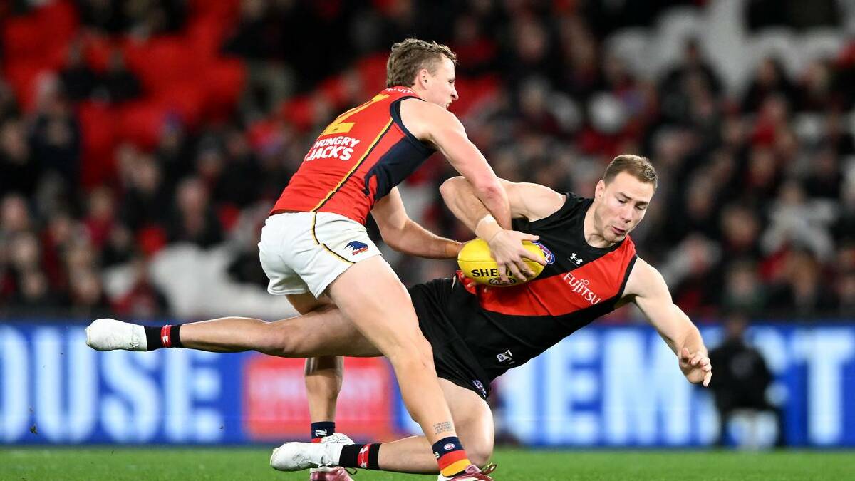 Crow Jordan Dawson (left) will miss the match against Hawthorn after entering concussion protocols. (James Ross/AAP PHOTOS)