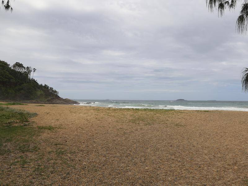 A body dressed in a singlet top and jeans was found at Jetty Beach in Coffs Harbour in June. (Rudi Maxwell/AAP PHOTOS)