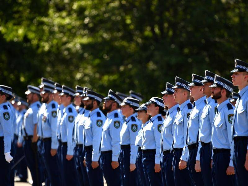 NSW has put paid training on the table to lure more police recruits. (Mick Tsikas/AAP PHOTOS)