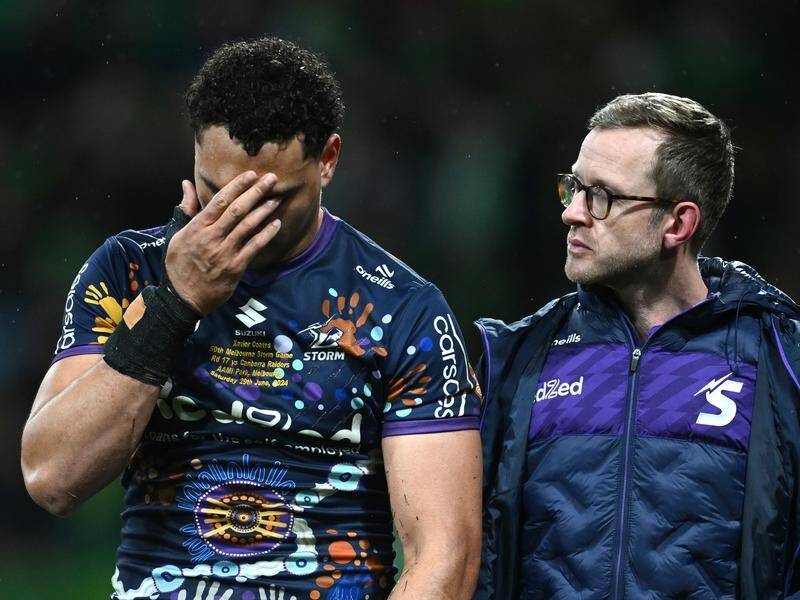 Melbourne Origin star Xavier Coates was disconsolate after being injured against Canberra. (Joel Carrett/AAP PHOTOS)