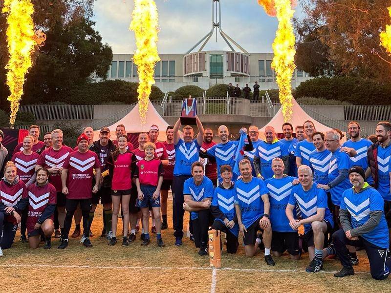 The Blues have claimed victory over the Maroons in a State of Origin rugby match outside parliament. (Supplied David Pococks Office/AAP PHOTOS)