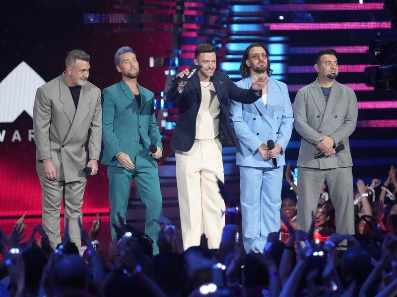 NSYNC have reunited to record a song that features in the animated movie Trolls Band Together. (AP PHOTO)