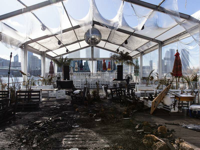 A man has been charged with setting fire to a Melbourne floating nightclub 18 months ago. Photo: Diego Fedele/AAP PHOTOS