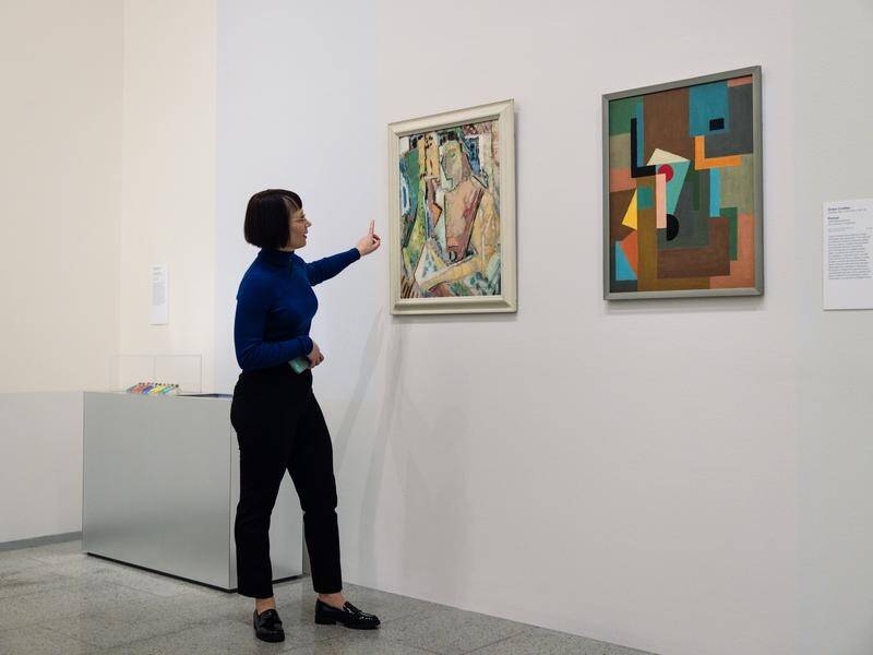 Ralph Balson's abstract is being exhibited alongside the Grace Crowley work that had concealed it. (Diego Fedele/AAP PHOTOS)