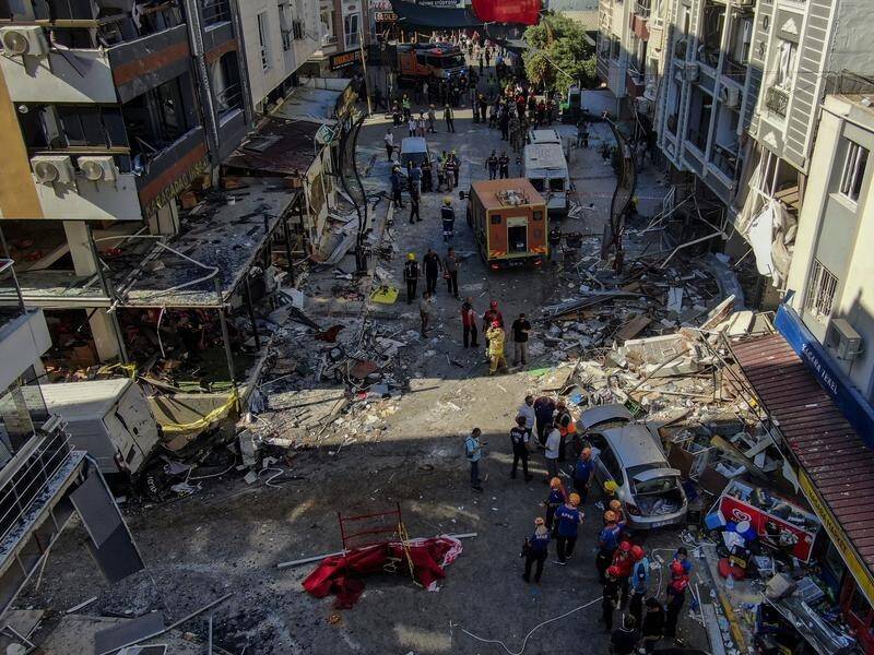 A propane tank explosion at a restaurant has killed five people and devastated a street in Izmir. (AP PHOTO)
