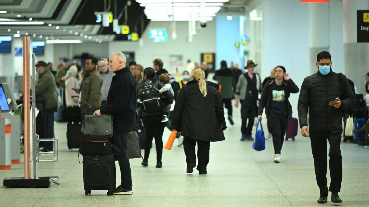 Travellers were still being affected on Saturday as airlines rescheduled cancelled flights. (James Ross/AAP PHOTOS)