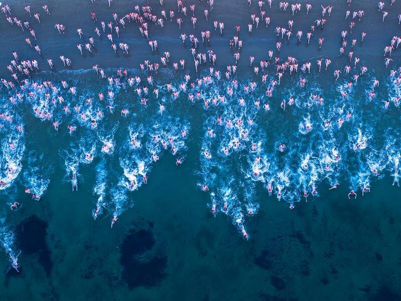 Dark Mofo's nude winter solstice swim has expanded to 3000 participants due to increased demand. (Rob Blakers/AAP PHOTOS)