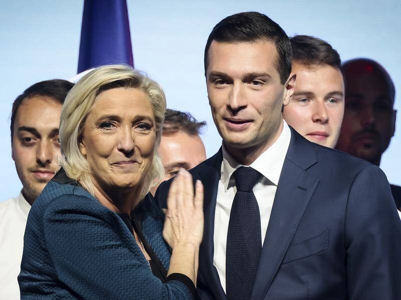 Far-right National Rally leader Marine Le Pen enlisted Jordan Bardella to her campaign team in 2017. (AP PHOTO)