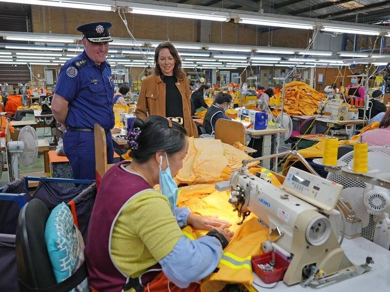 CFA chief Jason Heffernan and minister Jaclyn Symes welcomed local production of protective clothes. (PR HANDOUT IMAGE PHOTO)