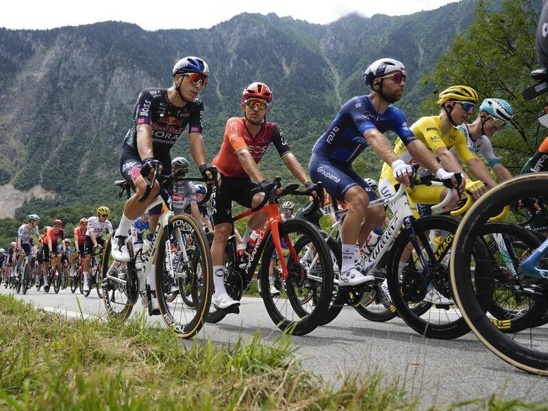 The Tour de France peloton will observe a minute's silence as a mark of respect for Andre Drege. (AP PHOTO)