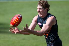 GWS midfielder Tom Green (pictured) has defended his decision to tackle Hawthorn's James Sicily. (Matt Turner/AAP PHOTOS)