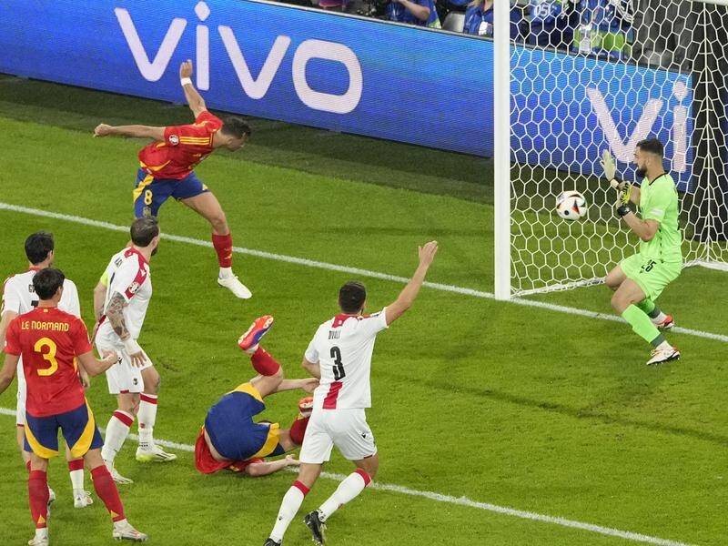 Spain's Fabian Ruiz headed home his side's second goal in the 4-1 defeat of Georgia. (AP PHOTO)