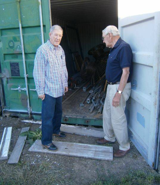 Men’s Shed stalwart Don Southwell (left) gives Rotarian Gordon Schliebs a look at the shipping container now providing much needed additional storage space. Don refers to it as the “Rotary container” because Rotarians provided half the cost of securing it.
