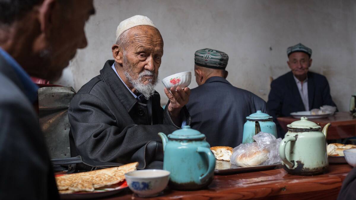 A Uighur man drinks tea at a tea shop in Kashgar City, Xinjiang, in 2017. Tension is increasing in the region due to westward Han majority migration and increased government control. Picture: Getty Images