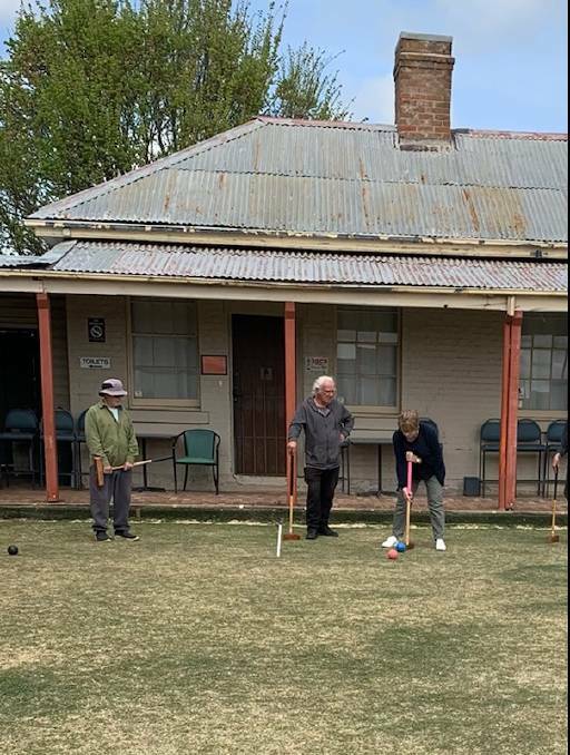 Members of the Goulburn Croquet Club having a game. Picture supplied. 
