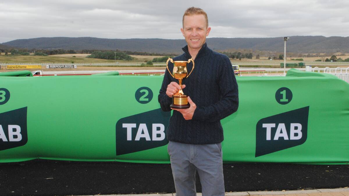 Winning jockey Kerrin McEvoy with his cup. Picture by Burney Wong.
