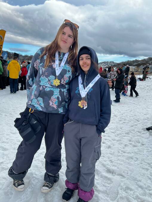 Lilly Ryan and Ella Hurtis with their medals after their slopestyle team success. Photo supplied. 