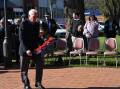 Goulburn RSL Sub Branch president Gordon Wade about to lay a wreath. Pictures by Burney Wong. 