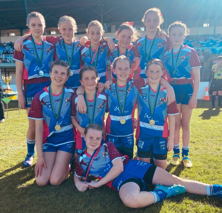 The u12 League Tag girls may have lost their final, but they put in a mighty effort. 