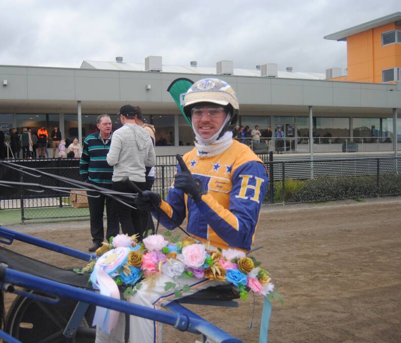 Cameron Heart following his Goulburn Cup win with horse Swayzee. 