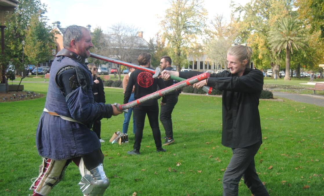Members of the public having a go at medieval fighting. Pictures by Burney Wong. 