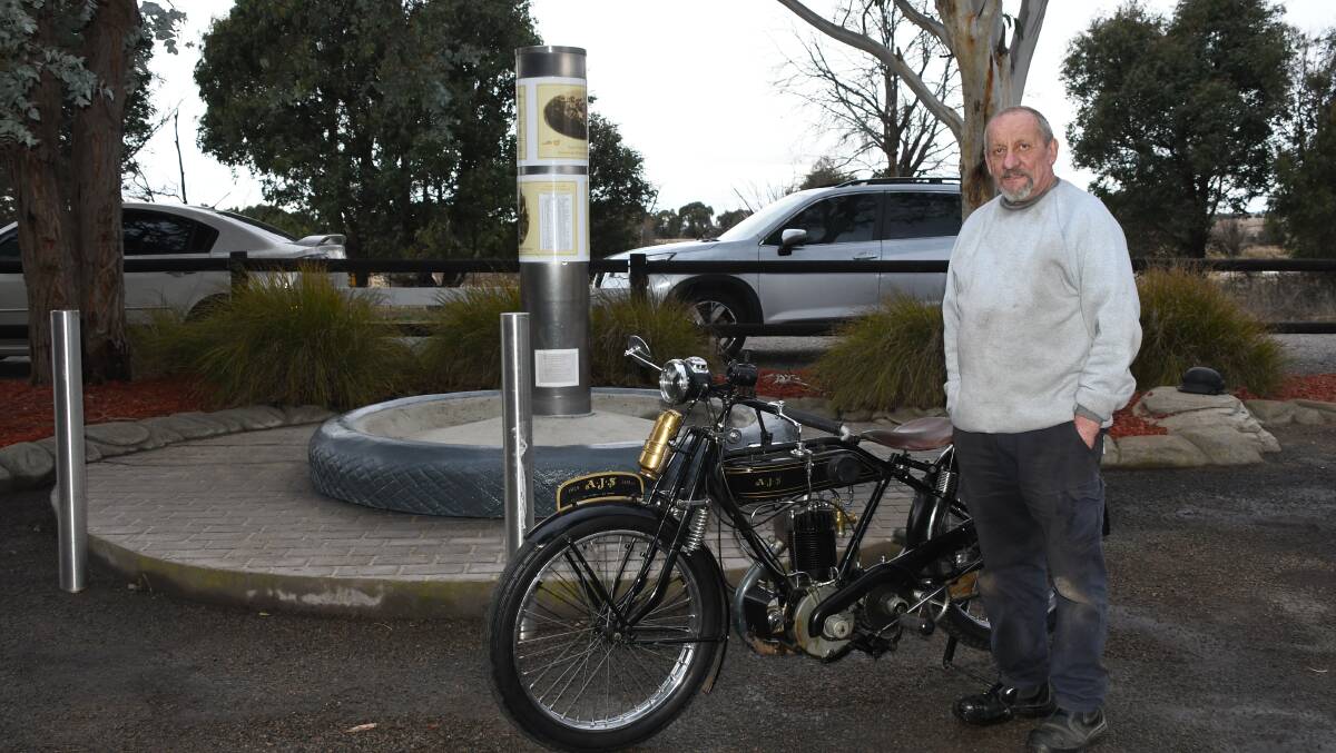 Allan Smith with his brother's 1924 AJS bike at the 1924 Motorcycle Grand Prix Memorial. Picture by Burney Wong. 
