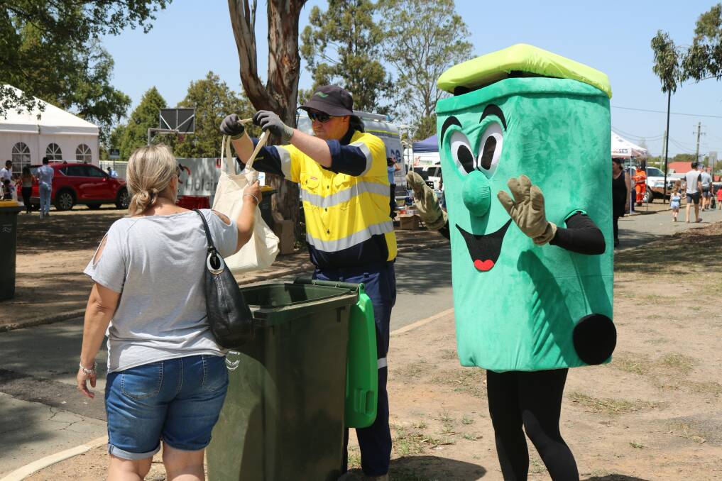 Sam Morris, Composting Officer and Binjamin handed out information in Victoria Park on Australia Day. Photo: Supplied.