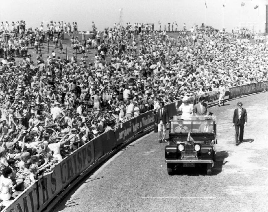 Charles and Di greet crowds at Newcastle's International Sports Centre from an open-topped Land Rover in 1983. Picture by the Newcastle Herald