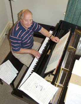 STEPPING DOWN: Dr Paviour, pictured in his home, says he will now have more time to compose music.